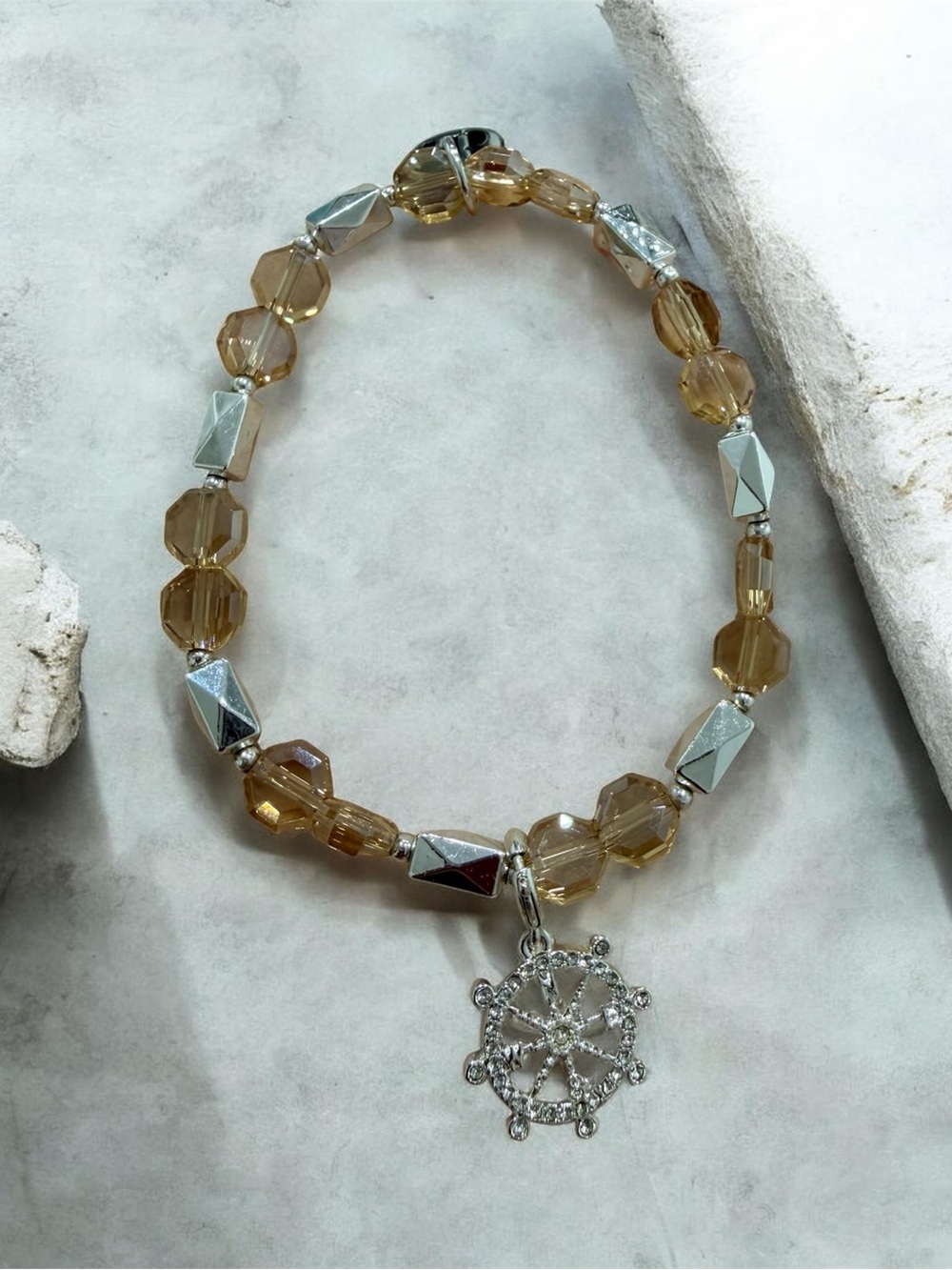 Gold-Tone Beaded Bracelet with Silver Wheel Charm
